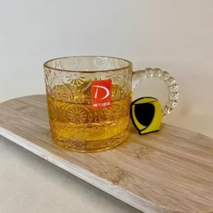 لیوان دسته مرواریدی مشبک شامپاینی
