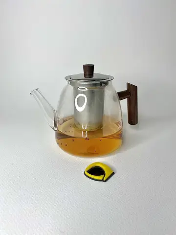 قوری پیرکس گرد تپل دسته چوبی تیره قوری پیرکس گرد تپل دسته چوبی تیره