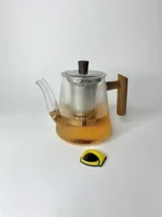 قوری پیرکس گرد شیاردار دسته چوبی تیره