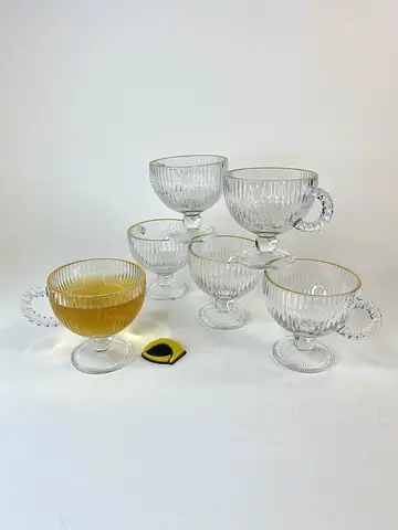 استکان بلور پایه دار لبه طلایی شیاردار استکان بلور پایه دار لبه طلایی شیاردار