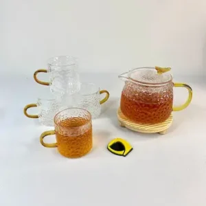 قوری و فنجان پیرکس برفی دسته طلایی برگ